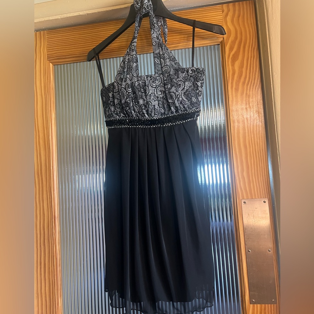 New Without Tags Sweet Storm dress that ties around the neck with sequin bust